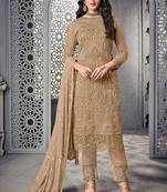 Beige net semi stitched wedding pant suit