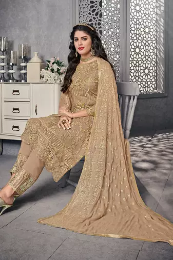 Beige net semi stitched wedding pant suit