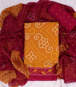 Mustard crepe bandhani print unstitched suit with chiffon dupatta