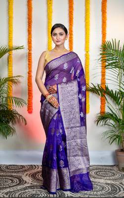 Ink blue organza silk saree with zari border and floral motifs 1