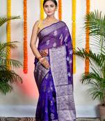 Ink blue organza silk saree with zari border and floral motifs