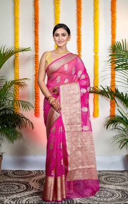 Pink organza silk saree with zari border and floral motifs 1