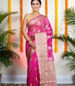 Pink organza silk saree with zari border and floral motifs