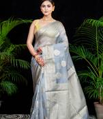 Grey organza silk saree with zari border and leaf motifs