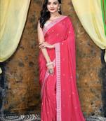 Pink embroidered crepe saree with embroidered lace border