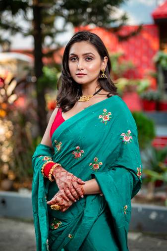 Green embroidered habutai silk saree with stone work
