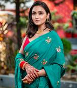 Green embroidered habutai silk saree with stone work