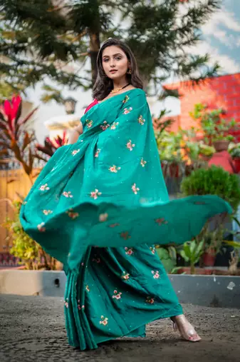 Green embroidered habutai silk saree with stone work