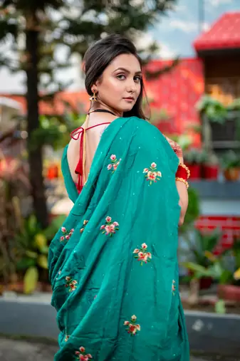 Green embroidered habutai silk saree with stone work