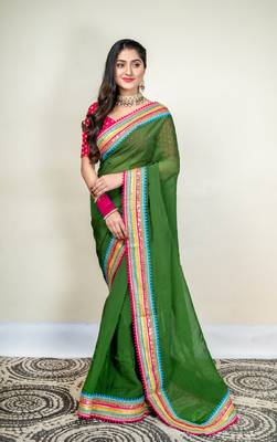 Moss green organza saree with multicolor border 1