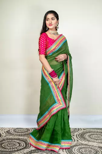 Moss green organza saree with multicolor border