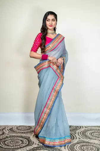 Grey organza saree with multicolor border