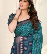 Turquoise Cotton Ikkat Print Tassels Saree With Unstitched Blouse Piece