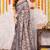 Cream silk blend ajrakh print woven silver border saree with unstitched blouse piece