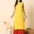 Lemon yellow solid round neck sleeveless straight calf length kurta