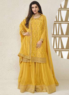 Chinnon jacquard yellow zari embroideyellow palazzo suit 1