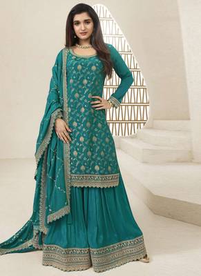 Chinnon jacquard turquoise zari embroideturquoise palazzo suit 1