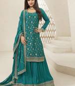 Chinnon jacquard turquoise zari embroideturquoise palazzo suit