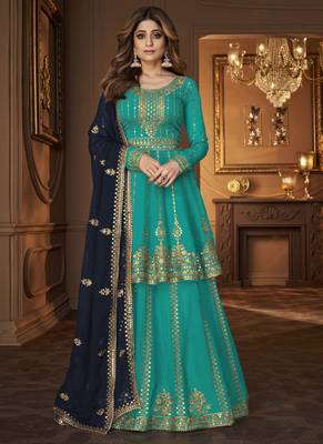 Turquoise and blue embroidered peplum top and lehenga 1