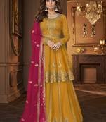 Yellow and Pink embroidered peplum top and lehenga
