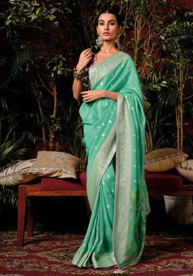 Sea green colour viscose dola silk zari woven saree with blouse 1