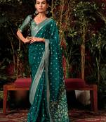 Teal green colour viscose dola silk zari woven saree with blouse