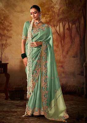 Sea green colour Faux kanjivaram banarasi silk woven saree with blouse 1