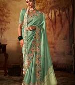 Sea green colour Faux kanjivaram banarasi silk woven saree with blouse