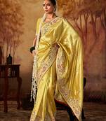 Yellow colour Faux kanjivaram banarasi silk woven saree with blouse