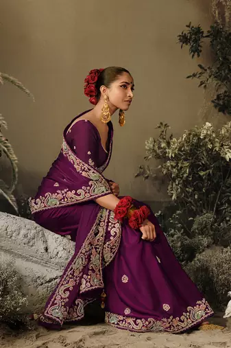 Dark purple colour tissue silk blend embroidered saree with blouse