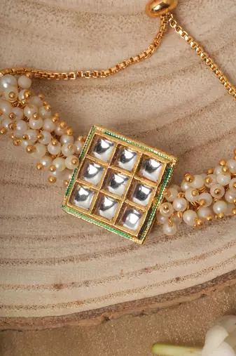 Gold Plated Bracelet with White Beads