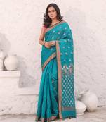 Teal cotton saree with zari border