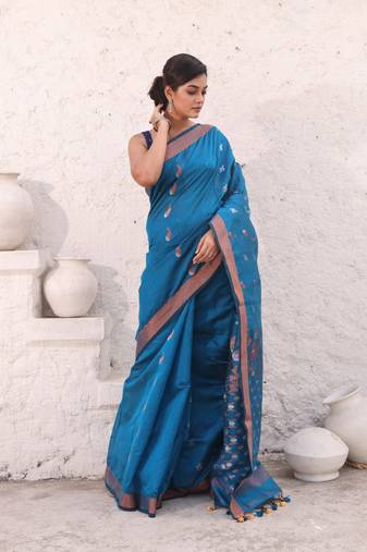 Teal blue cotton saree with zari border