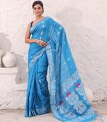 Sky blue cotton saree with woven designs and zari border