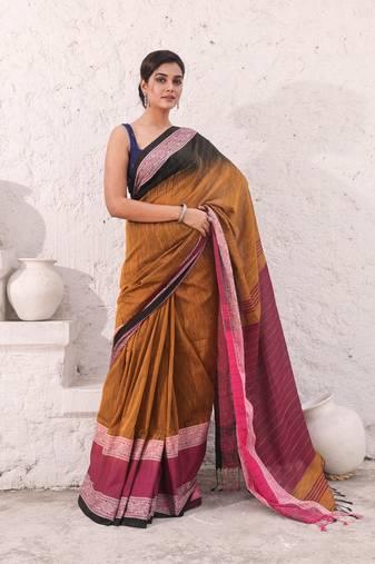 Mustard pure cotton ikkat saree with texture border
