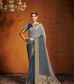 Blue Ethnic Zari Woven Saree In Georgette c Saree