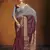 Maroon Ethnic Zari Woven Saree In Georgette c Saree