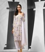White cotton suit set with printed designs