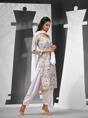 White cotton suit set with printed designs 2