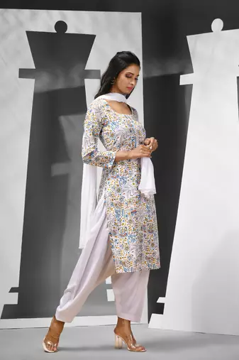White cotton suit set with printed designs