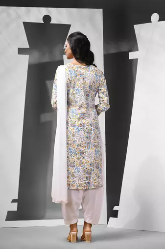 White cotton suit set with printed designs