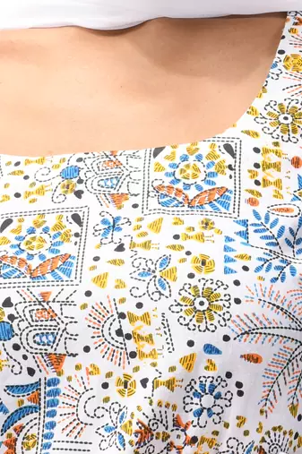 White cotton suit set with printed designs