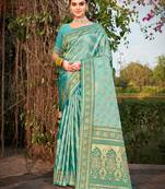 Sangam Prints Rama Green Stain Silk Woven Work Traditional Tassels Saree