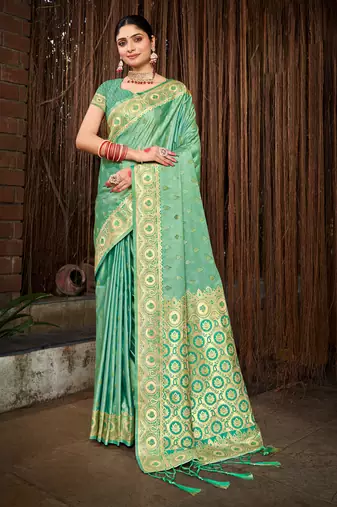 Sangam prints rama green stain silk woven work traditional tassels saree