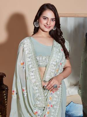 Green georgette embroidery work saree with blouse piece 4
