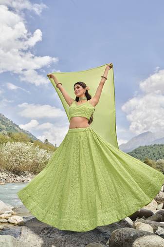 PARROT GREEN SEQUINS AND THREAD EMBROIDERED FAUX GEORGETTE FESTIVE & PARTY WEAR SEMI STITCHED LEHENGA