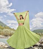 PARROT GREEN SEQUINS AND THREAD EMBROIDERED FAUX GEORGETTE FESTIVE & PARTY WEAR SEMI STITCHED LEHENGA
