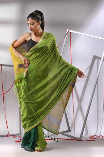 Green cotton saree with sequine work and zari stripe pallu