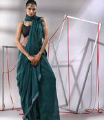 Teal cotton saree with sequined pallu