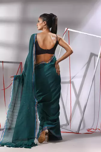 Teal cotton saree with sequined pallu